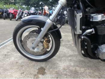Çàêàçàòü èç ßïîíèè ìîòîöèêë Honda X4 1997 ôîòî 14
